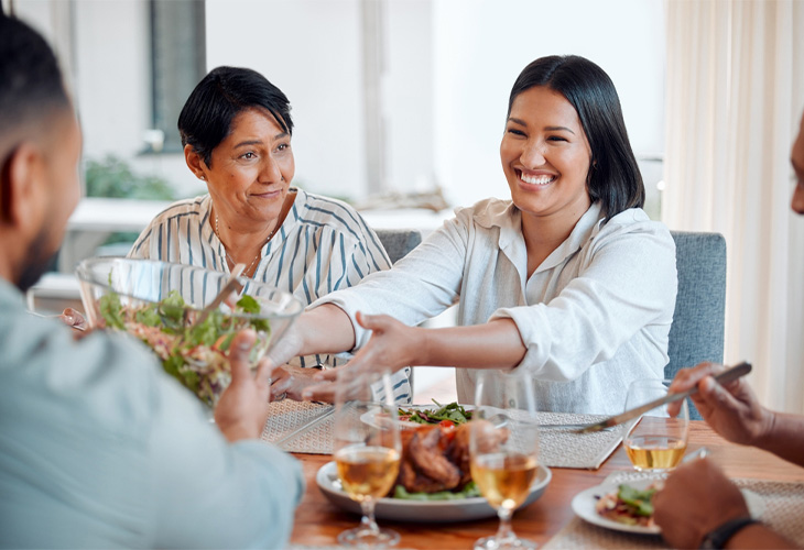 Woman having lunch with family