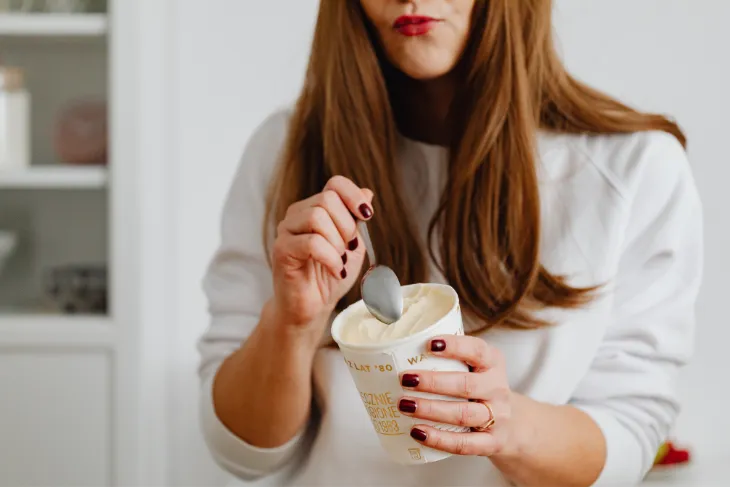 Woman eating ice cream, Weight Management During Menopause
